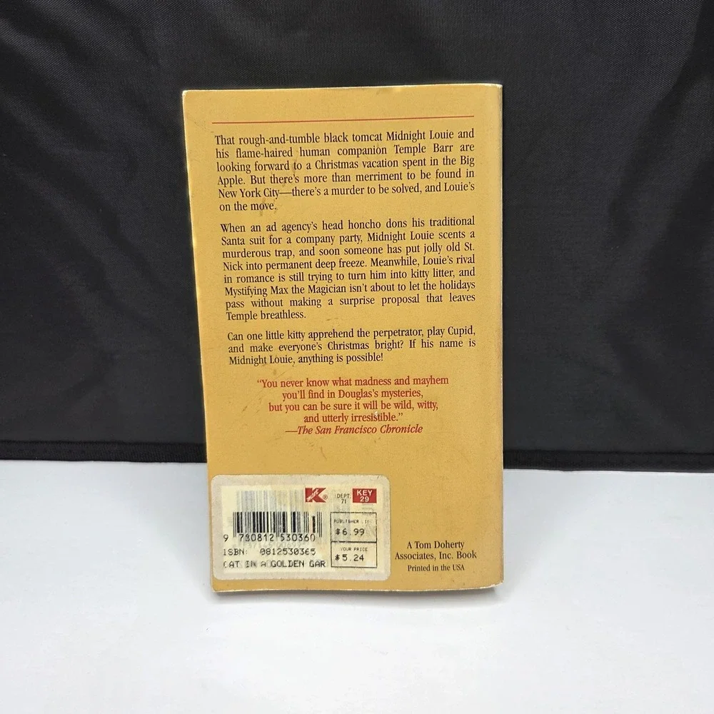 Cat in a Golden Garland by Carole Nelson Douglas Midnight Louie Mystery